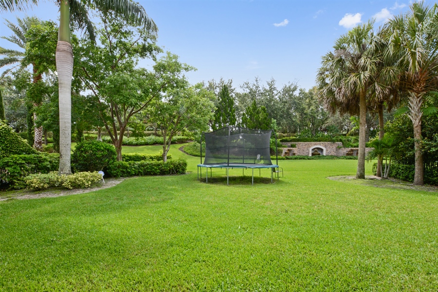 Real Estate Photography - 6986 Spyglass Ave, Parkland, FL, 33076 - Rear View