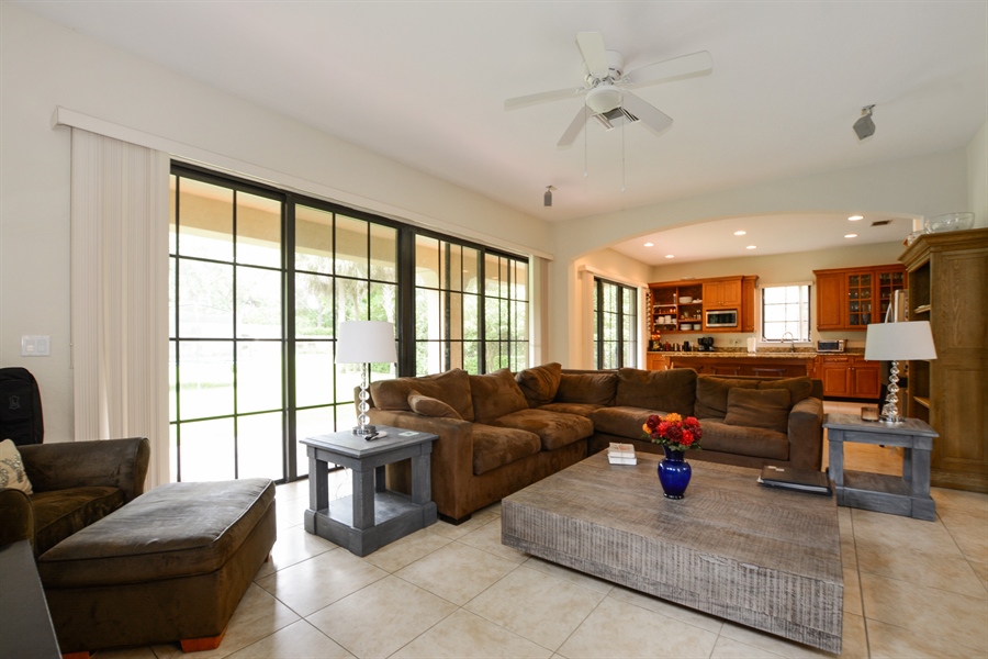 Real Estate Photography - 6986 Spyglass Ave, Parkland, FL, 33076 - Family Room / Kitchen
