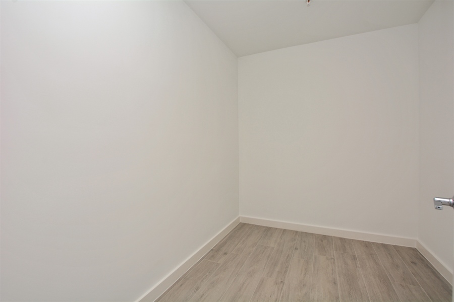 Real Estate Photography - 1900 SE 2nd, 501, Deerfield Beach, FL, 33441 - Primary Bedroom Closet