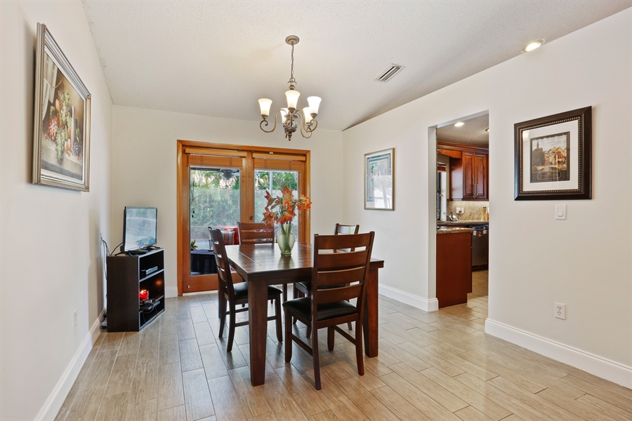 Real Estate Photography - 8920 SW 159th Ter, Palmetto Bay, FL, 33157 - Dining Room