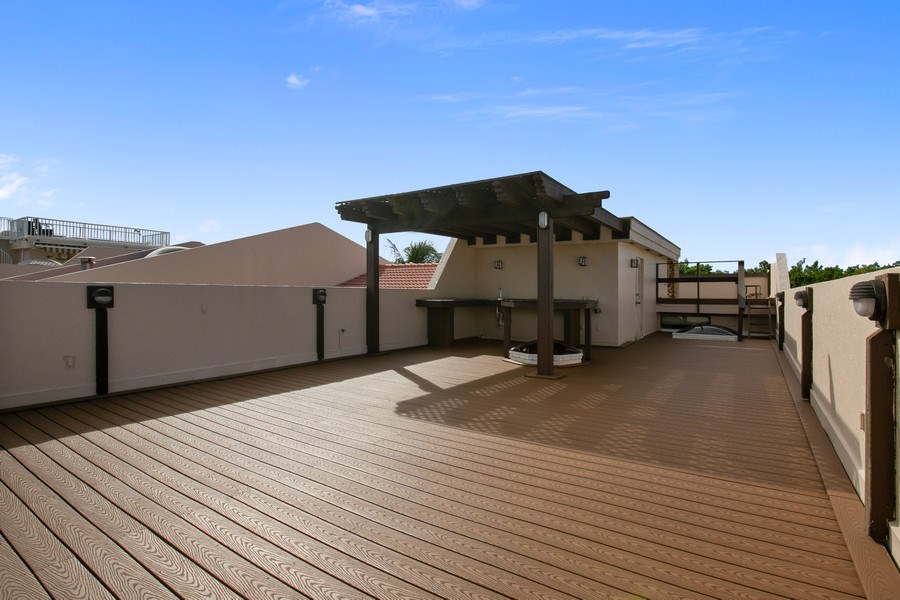 Real Estate Photography - 6018 Paradise Point Drive, Palmetto Bay, FL, 33157 - Rooftop Terrace with Water Views