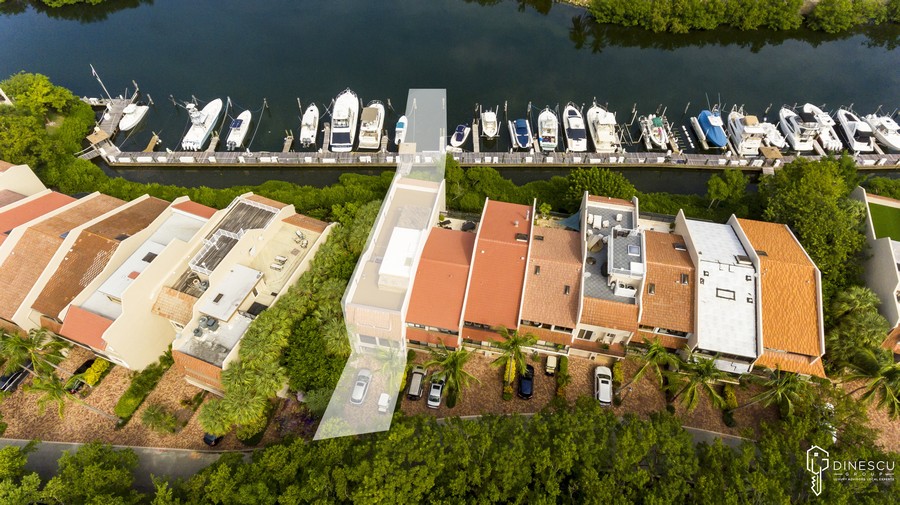 Real Estate Photography - 6018 Paradise Point Drive, Palmetto Bay, FL, 33157 - Aerial View of the Community  (House and Boat Slip