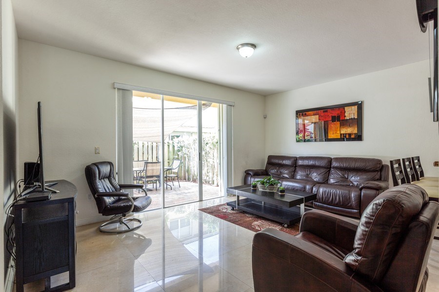 Real Estate Photography - 8160 NW 116th Avenue, Doral, FL, 33178 - Family Room