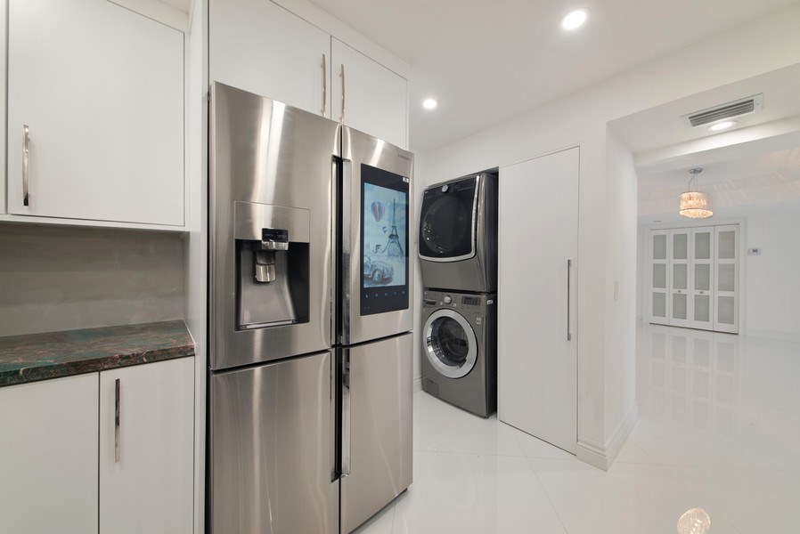 Real Estate Photography - 3610 S. Ocean Blvd., #402, Palm Beach, FL, 33480 - Laundry Room