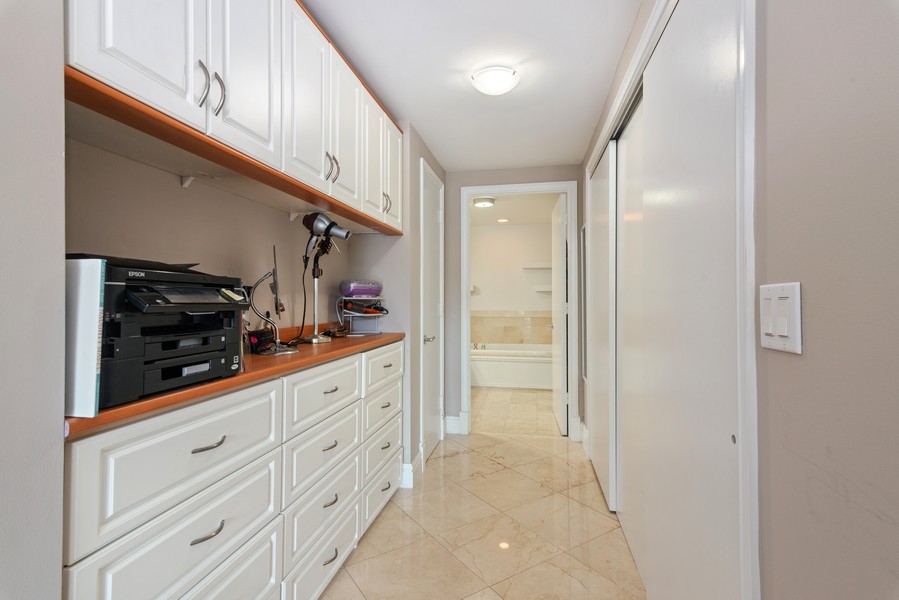 Real Estate Photography - 3400 SW 27th Avenue, #1104, Miami, FL, 33133 - Primary Bedroom Closet