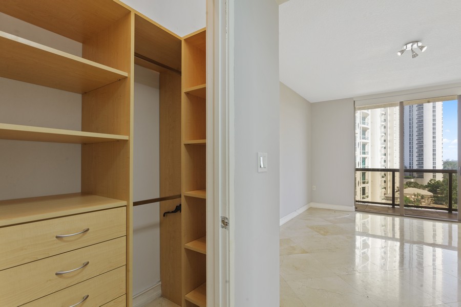 Real Estate Photography - 16275 Collins Avenue 904, Sunny Isles Beach, FL, 33160 - Primary Bedroom Closet