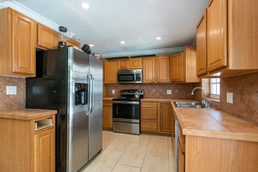 Real Estate Photography - 490 SW 49 Terrace, Margate, FL, 33068 - Kitchen