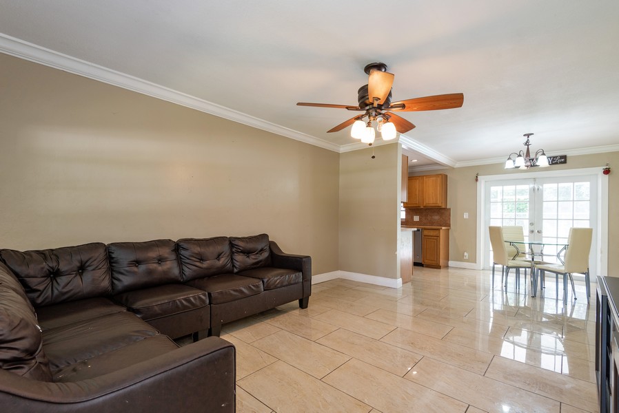 Real Estate Photography - 490 SW 49 Terrace, Margate, FL, 33068 - Living Room / Dining Room