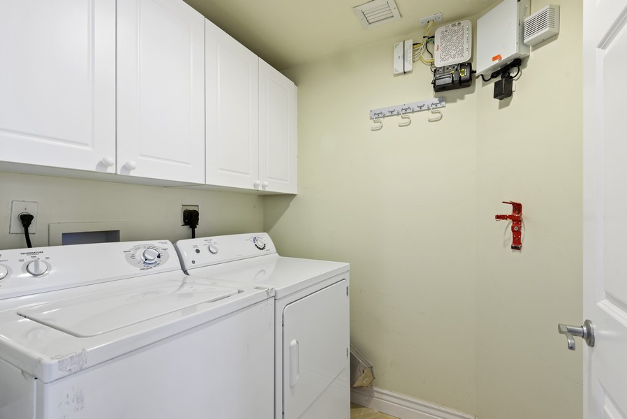 Real Estate Photography - 100 S Birch Rd 2504E, Fort Lauderdale, FL, 33316 - Laundry Room