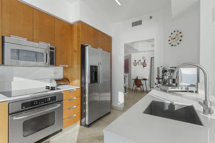 Real Estate Photography - 6515 COLLINS AVE #1003, Miami Beach, FL, 33141 - Kitchen