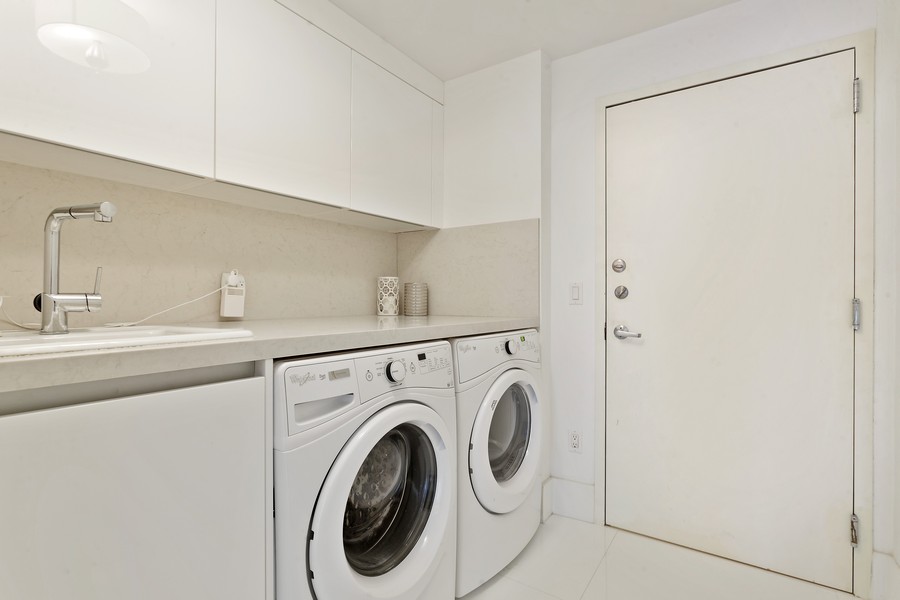 Real Estate Photography - 10101 collins avenue, 15E, Bal Harbour, FL, 33154 - Laundry Room