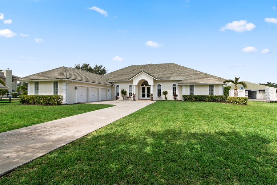 Real Estate Photography - 14628 Draft Horse Lane, Wellington, FL, 33414 - Front View