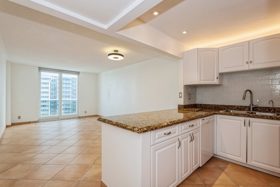 Real Estate Photography - 336 N Birch Rd., #11B, Fort Lauderdale, FL, 33304 - Kitchen / Living Room