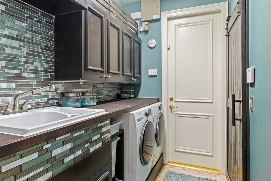 Real Estate Photography - 8517 Legend Club Drive, West Palm Beach, FL, 33412 - Laundry Room
