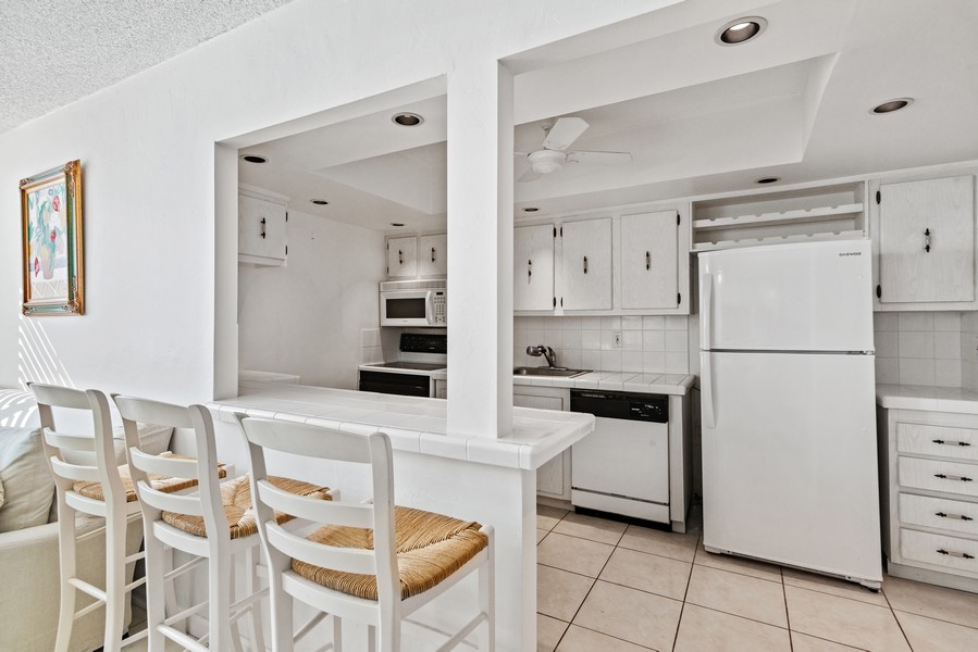 Real Estate Photography - 9273 Collins Ave #901, Miami Beach, FL, 33154 - Kitchen / Breakfast Room