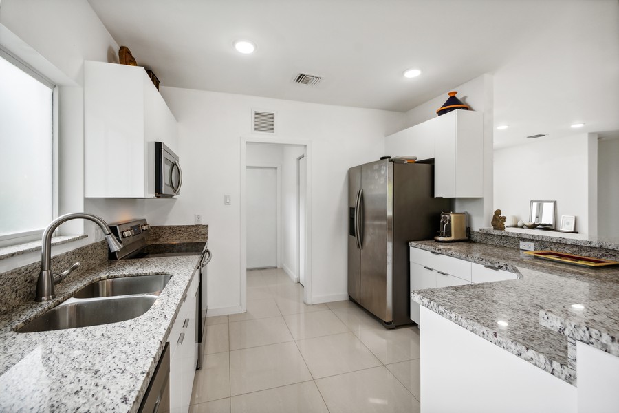 Real Estate Photography - 127 Northeast 90th Street, El Portal, FL, 33138 - Kitchen