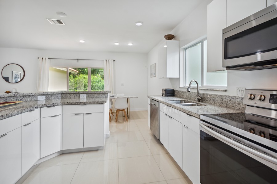 Real Estate Photography - 127 Northeast 90th Street, El Portal, FL, 33138 - Kitchen