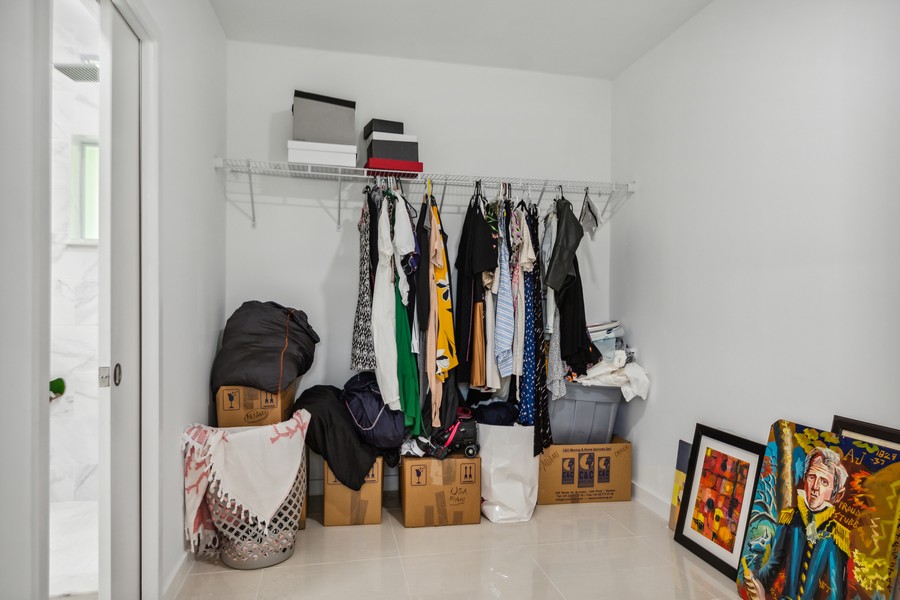 Real Estate Photography - 127 Northeast 90th Street, El Portal, FL, 33138 - Primary Bedroom Closet