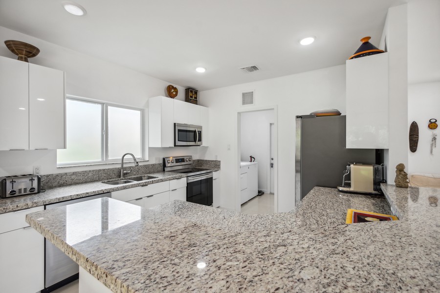 Real Estate Photography - 127 Northeast 90th Street, El Portal, FL, 33138 - Kitchen