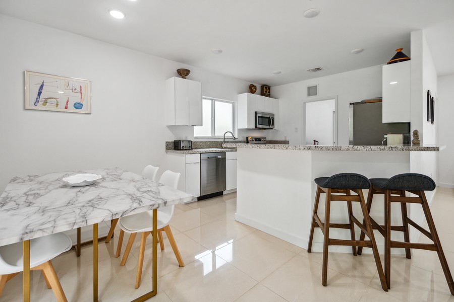 Real Estate Photography - 127 Northeast 90th Street, El Portal, FL, 33138 - Kitchen / Dining Room