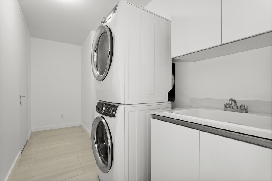 Real Estate Photography - 18975 Collins Ave, Unit 1802, Sunny Isle Beach, FL, 33160 - Laundry Room