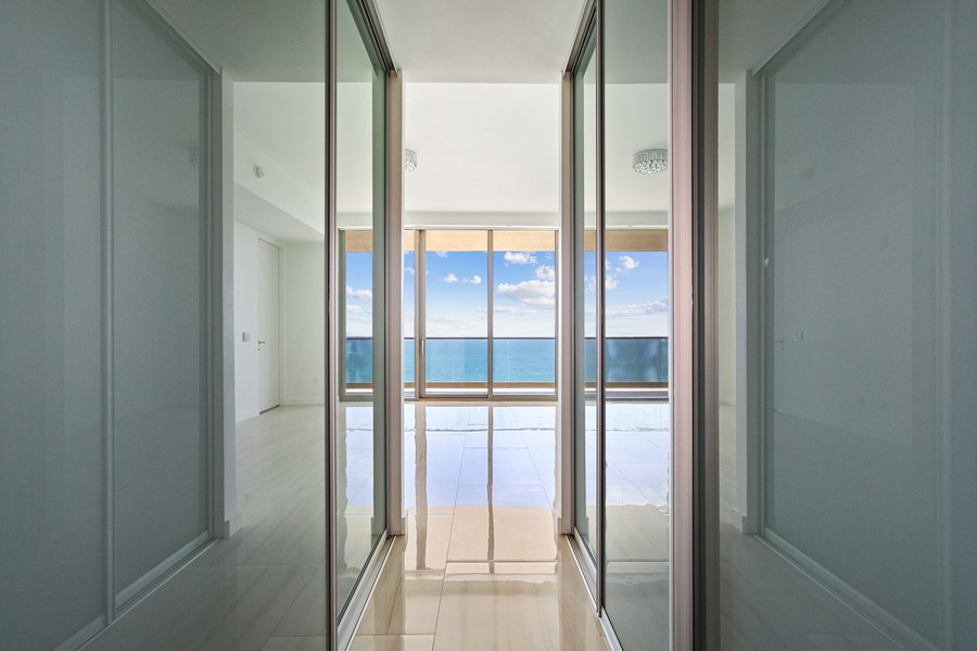 Real Estate Photography - 18975 Collins Ave, Unit 1802, Sunny Isle Beach, FL, 33160 - Primary Bedroom Closet