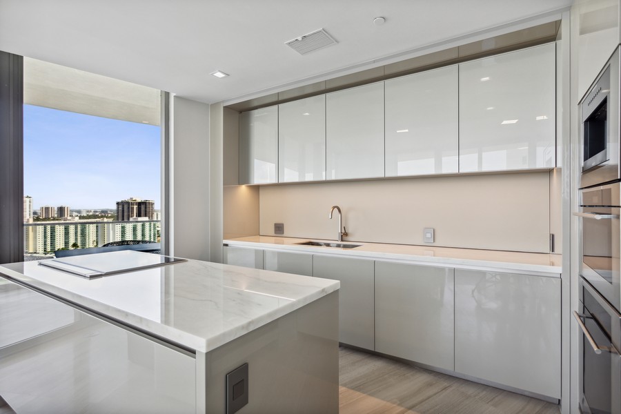 Real Estate Photography - 18975 COLLINS AVENUE 1905, Sunny Isles Beach, FL, 33160 - Kitchen