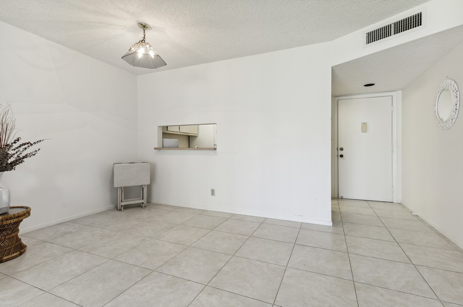 Real Estate Photography - 5370 Las Verdes Circle #201, Delray Beach, FL, 33484 - Dining Room