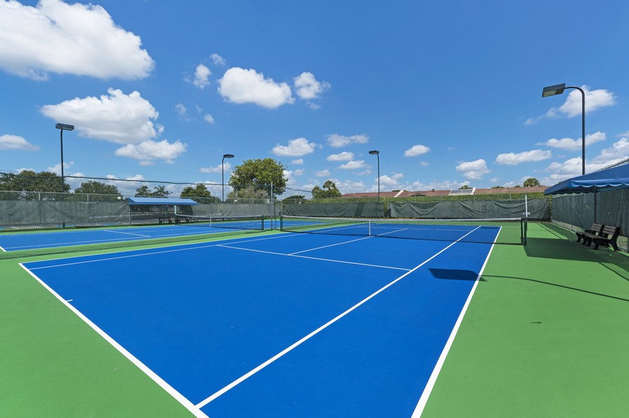 Real Estate Photography - 5370 Las Verdes Circle #201, Delray Beach, FL, 33484 - Tennis Court