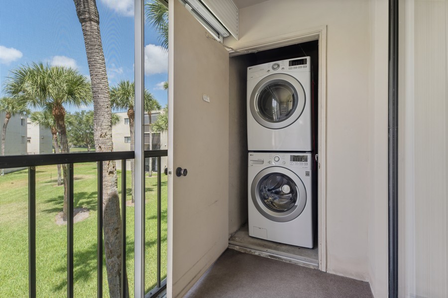 Real Estate Photography - 5370 Las Verdes Circle #201, Delray Beach, FL, 33484 - Laundry Room