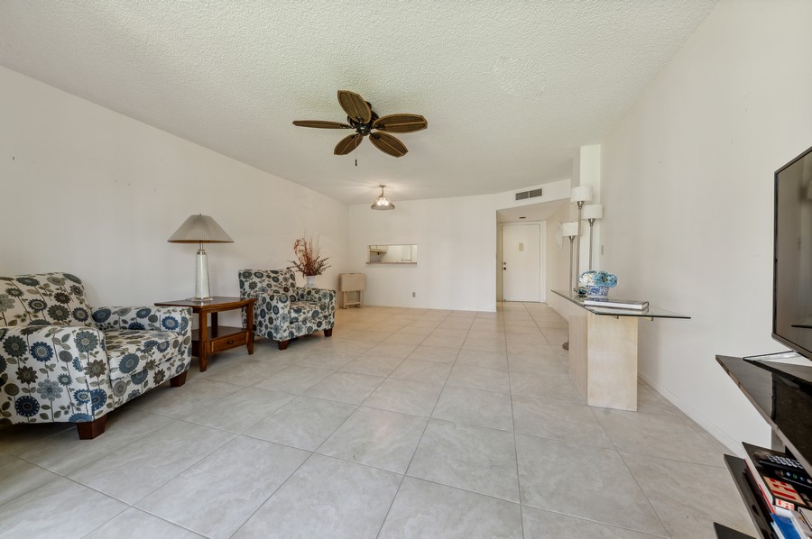 Real Estate Photography - 5370 Las Verdes Circle #201, Delray Beach, FL, 33484 - Living Room/Dining Room