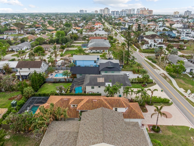 Real Estate Photography - 10242 Vanderbuilt Dr, Naples, FL, 34108 - Aerial View