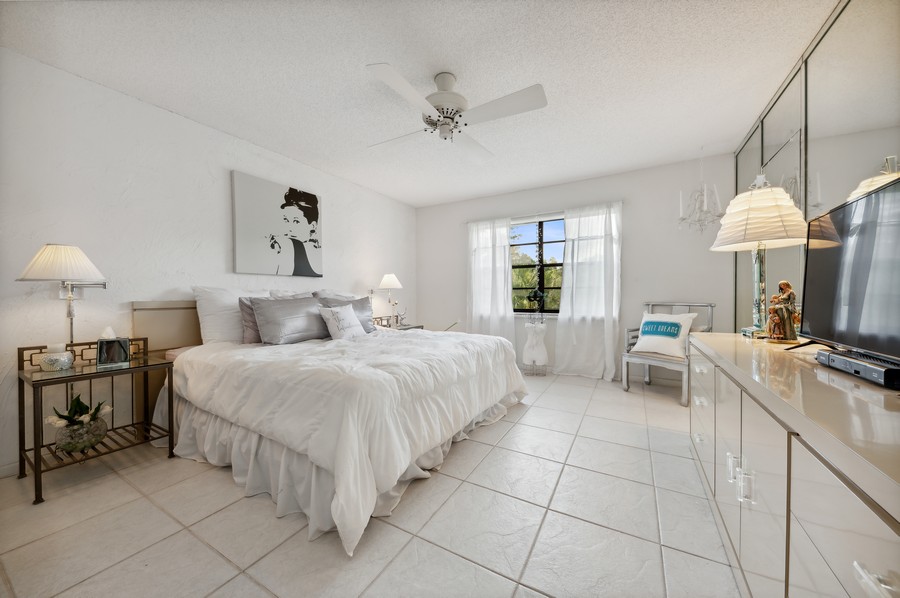 Real Estate Photography - 21691 Tall Palm Circle D-3, Boca Raton, FL, 33433 - Primary Bedroom
