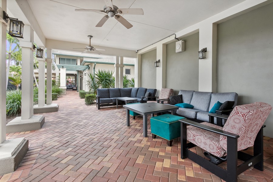 Real Estate Photography - 930 Millbrae Ct. #1, West Palm Beach, FL, 33401 - Clubhouse outdoor area