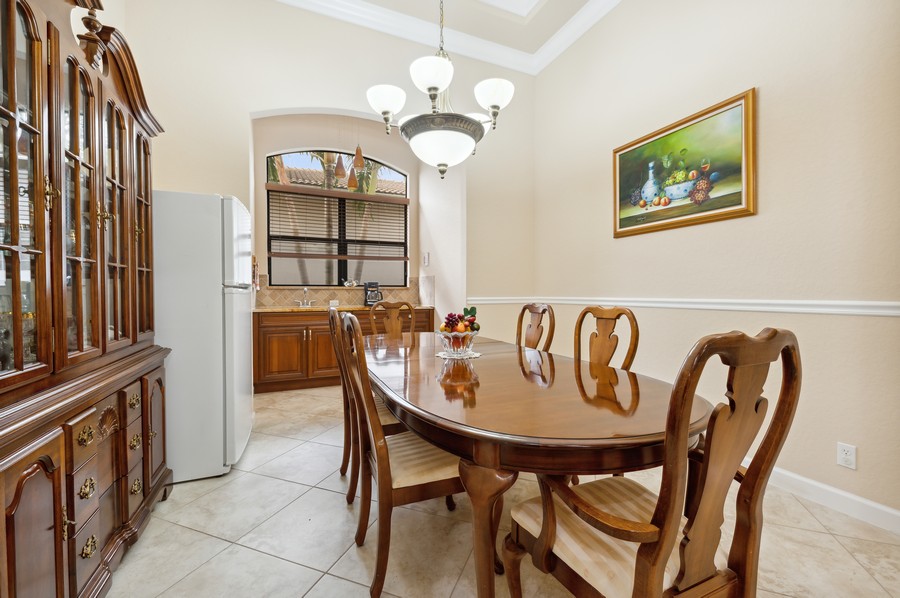 Real Estate Photography - 15660 Glencrest Avenue, Delray Beach, FL, 33446 - Dining Room