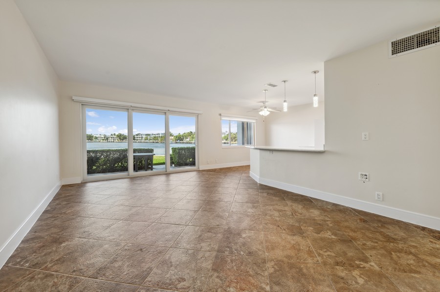 Real Estate Photography - 1201 S Riverside Drive #107, Pompano Beach, FL, 33062 - Living Room / Dining Room