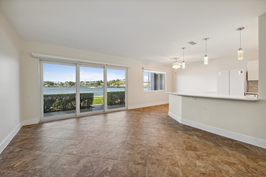 Real Estate Photography - 1201 S Riverside Drive #107, Pompano Beach, FL, 33062 - Living Room/Dining Room