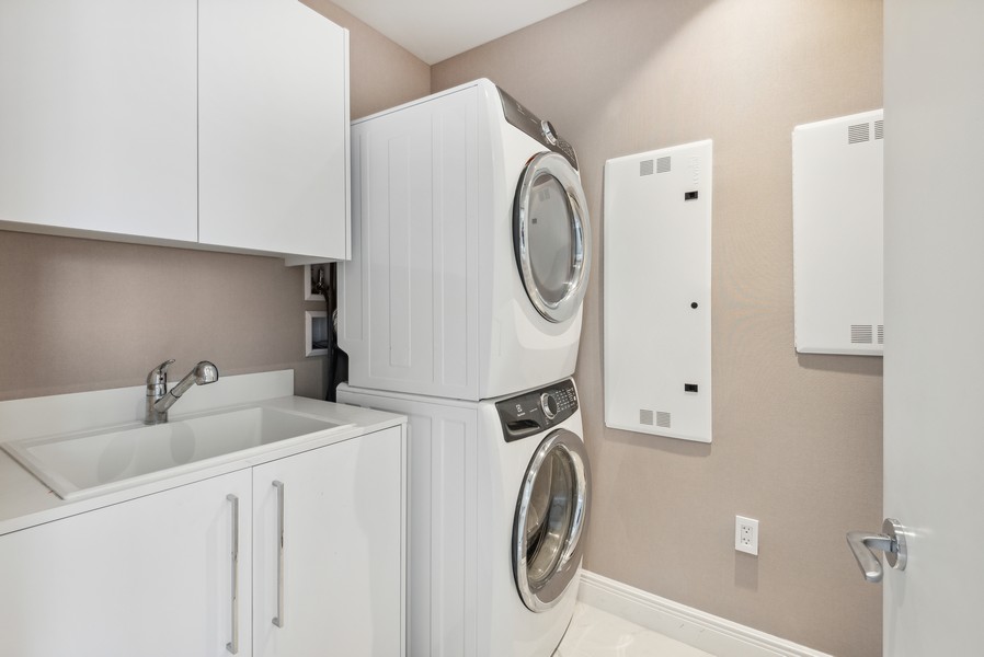 Real Estate Photography - 15701 Collins Ave, Unit 2902, Sunny Isles Beach, FL, 33301 - Laundry Room