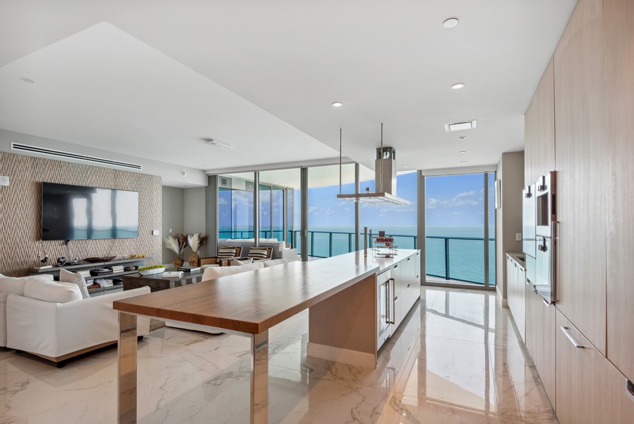 Real Estate Photography - 15701 Collins Ave, Unit 2902, Sunny Isles Beach, FL, 33301 - Kitchen/Living