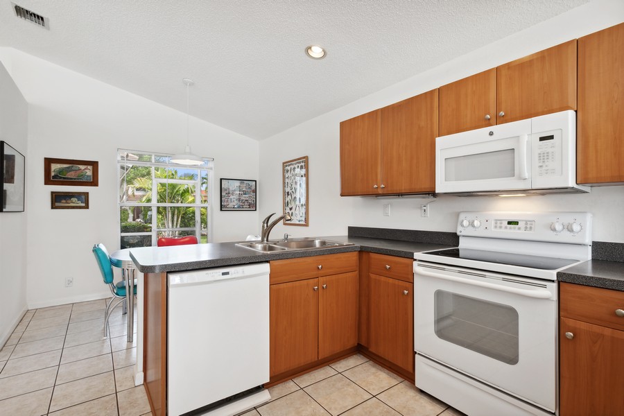 Real Estate Photography - 6288 Barton Creek Circle, Lake Worth, FL, 33463 - Kitchen and Eat In Breakfast area