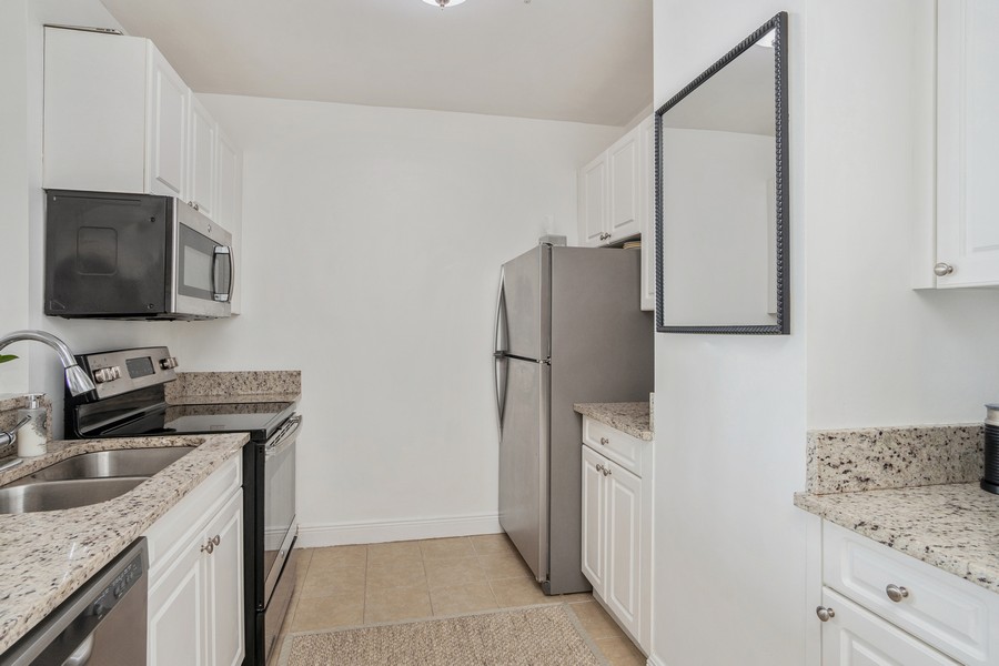 Real Estate Photography - 255 Evernia St, Unit 403, West Palm Beach, FL, 33401 - Kitchen