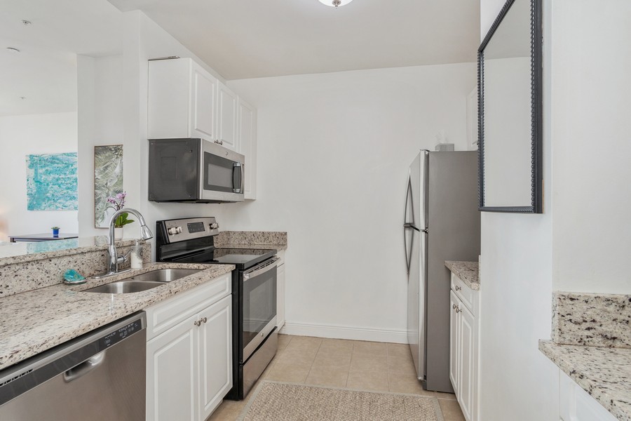 Real Estate Photography - 255 Evernia St, Unit 403, West Palm Beach, FL, 33401 - Kitchen
