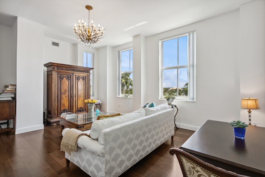 Real Estate Photography - 255 Evernia St, Unit 403, West Palm Beach, FL, 33401 - Living Room 3 windows