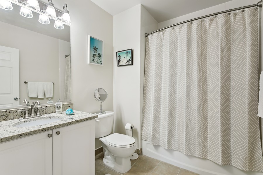 Real Estate Photography - 255 Evernia St, Unit 403, West Palm Beach, FL, 33401 - Guest Bathroom