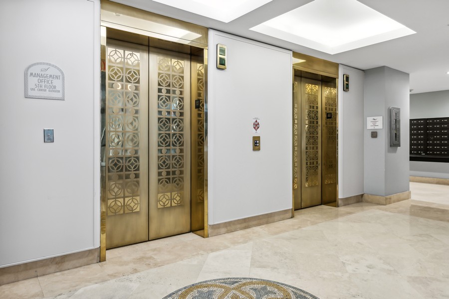 Real Estate Photography - 255 Evernia St, Unit 403, West Palm Beach, FL, 33401 - Lobby