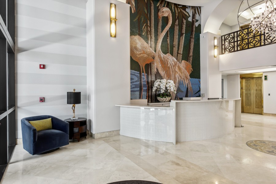 Real Estate Photography - 255 Evernia St, Unit 403, West Palm Beach, FL, 33401 - Lobby Flamingo's