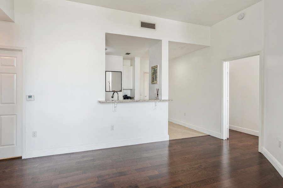Real Estate Photography - 255 Evernia St, Unit 403, West Palm Beach, FL, 33401 - Dining Room