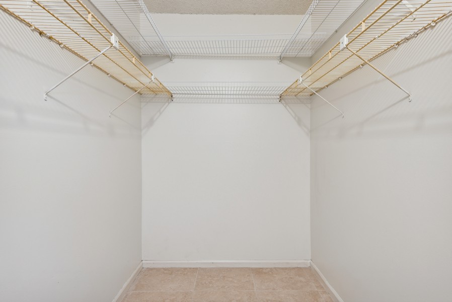 Real Estate Photography - 777 S federal Hwy H202, Pompano Beach, FL, 33062 - Primary Bedroom Closet