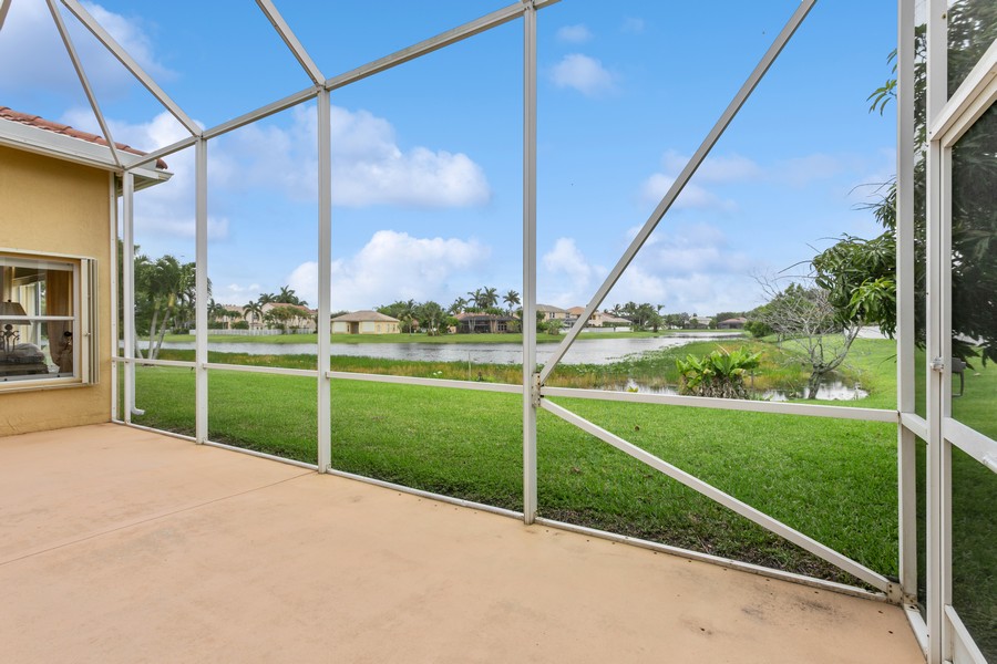 Real Estate Photography - 6159 Shadow Tree Ln, Lake Worth, FL, 33463 - Views from Patio