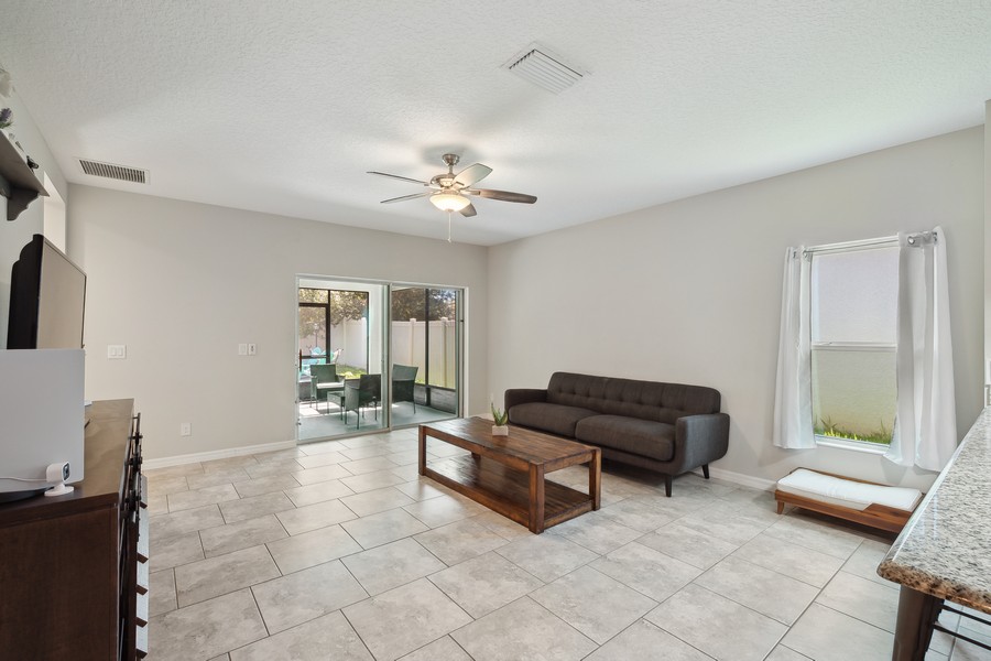 Real Estate Photography - 26026 Meadow Breeze Lane, Leesburg, FL, 34748 - Living Room